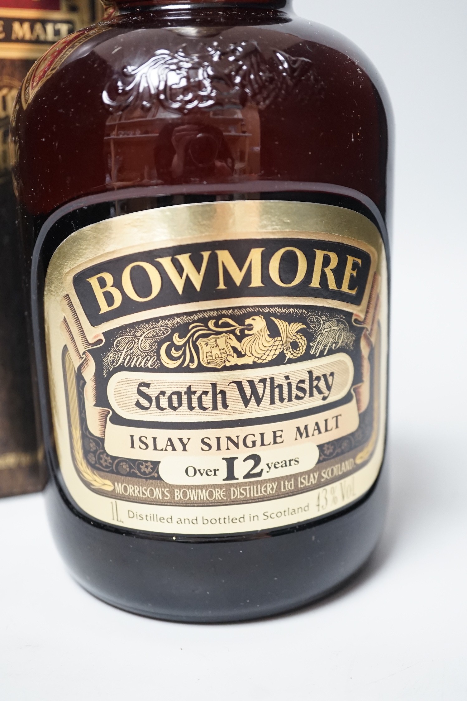 A litre bottle of Bowmore 12 year single malt whisky, 1970s bottling